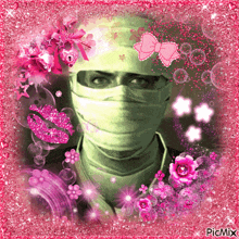 a picture of a man wearing a bandage on his face is surrounded by pink flowers