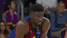 a basketball player wearing a shirt that says turkish airlines on it
