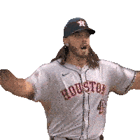 a baseball player wearing a houston jersey with his arms outstretched