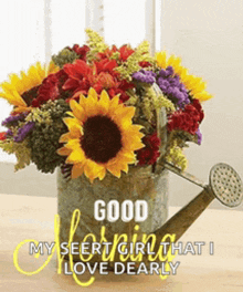 a bouquet of flowers in a watering can with the words " good morning my seer girl that i love dearly "