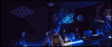a blurry picture of a person playing a guitar with a purple and blue background