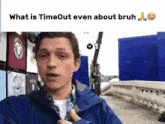 a man in a blue jacket stands in front of a sign that says what is timeout even about bruh