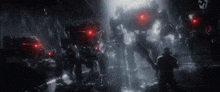 a group of soldiers are standing in a dark room with red lights on them