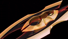 a gold and black object with a black background