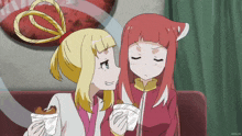 two anime girls are sitting next to each other with one holding a fried chicken sandwich