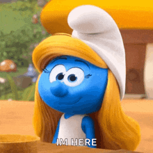 a smurf with blonde hair and a white hat says im here