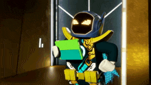 a robot holding a green box with the letter l on the bottom