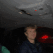 a blurry picture of a person wearing a jacket that says the north face