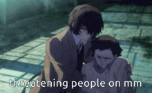 a man is hugging another man with the words threatening people on mm