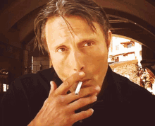 Mads Mikkelsen Smoking GIF - Mads Mikkelsen Smoking Cigarette GIFs