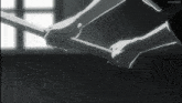 a black and white drawing of a person holding a sword with a watermark that says animenet.tv on the bottom right