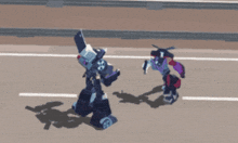 two robots are fighting each other on a street