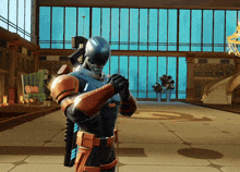 a man in a superhero costume is standing in a large room