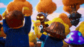 a group of lego ninjago characters are standing in a forest