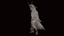a statue of a white animal with horns and feathers on a black background