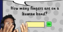 a man is covering his face in front of a question about how many fingers on a human hand