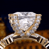 a gold ring with a diamond in the center