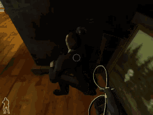 a screenshot of a video game shows a man crawling on the floor and the words fire ( hold ) on the bottom