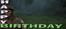arnold schwarzenegger is holding a sword in a field and says happy birthday