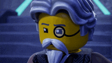 a close up of a lego man with glasses and a beard