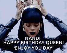 a woman is wearing a crown on her head and says happy birthday queen .