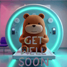 a teddy bear sitting in front of a mri machine with the words get well soon written on it