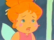a cartoon girl with orange hair and green eyes