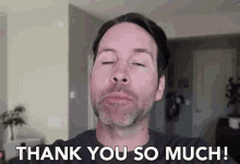 a man with his eyes closed and the words thank you so much behind him