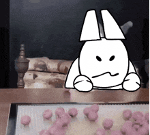 a black and white drawing of a rabbit with an angry face sitting on a table