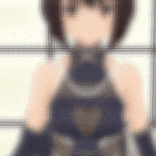 a blurry picture of a girl in a blue top