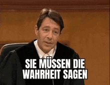 a man in a judge 's robe is sitting in a courtroom and saying sie mussen die wahrheit sagen