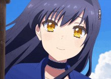 a close up of a girl 's face with a blue shirt on