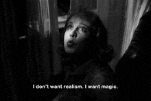 a black and white photo of a woman with the words i don t want realism i want magic