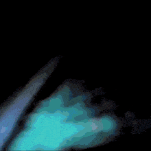 a computer generated image of a blue light coming out of a hole