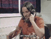 a woman talking on a phone with the words " can i help you " written below her