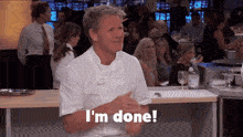 a chef says i 'm done while standing in front of a crowd