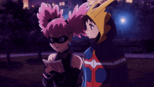 a boy and a girl standing next to each other