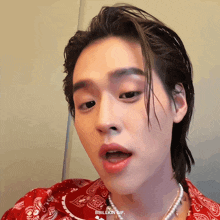 a close up of a person 's face with the words billikin gif on the bottom right
