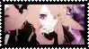 a blurred image of a girl with purple eyes and a white face .