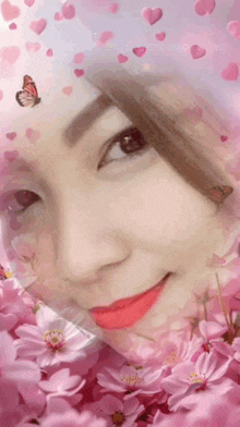a woman is surrounded by pink flowers and hearts with a butterfly on her head