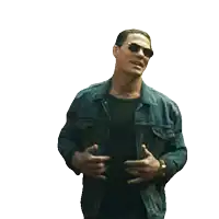 a man wearing sunglasses and a black tank top has his jacket open
