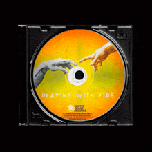 a cd that says playing with fire on the cover