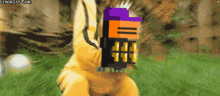 a pixelated image of a person holding a purple and orange object with senorgif.com written below it