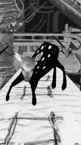 a black and white drawing of a deer standing on a table