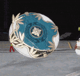 a circular object with a flower in the center