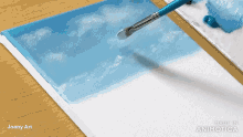 a painting of a cloudy sky is being made by joony art