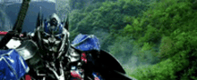 Optimus Prime Transformers GIF - Optimus Prime Transformers Punch GIFs