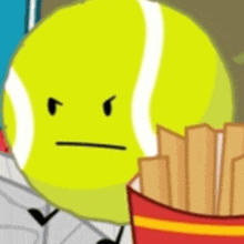 a cartoon tennis ball with an angry face is standing next to a bucket of french fries .