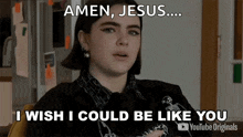 a woman is sitting in a chair and saying amen , jesus ... i wish i could be like you