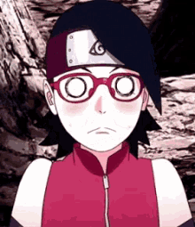a close up of a girl wearing glasses and a headband from naruto .
